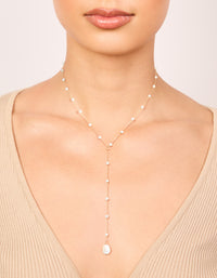 Delicate waterproof gold plated stainless steel pearl Y-necklace with dainty design on neck view - link has visual effect only