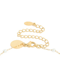 Featuring waterproof gold plated stainless steel pearl Y-necklace with dainty design clasp detail view - link has visual effect only