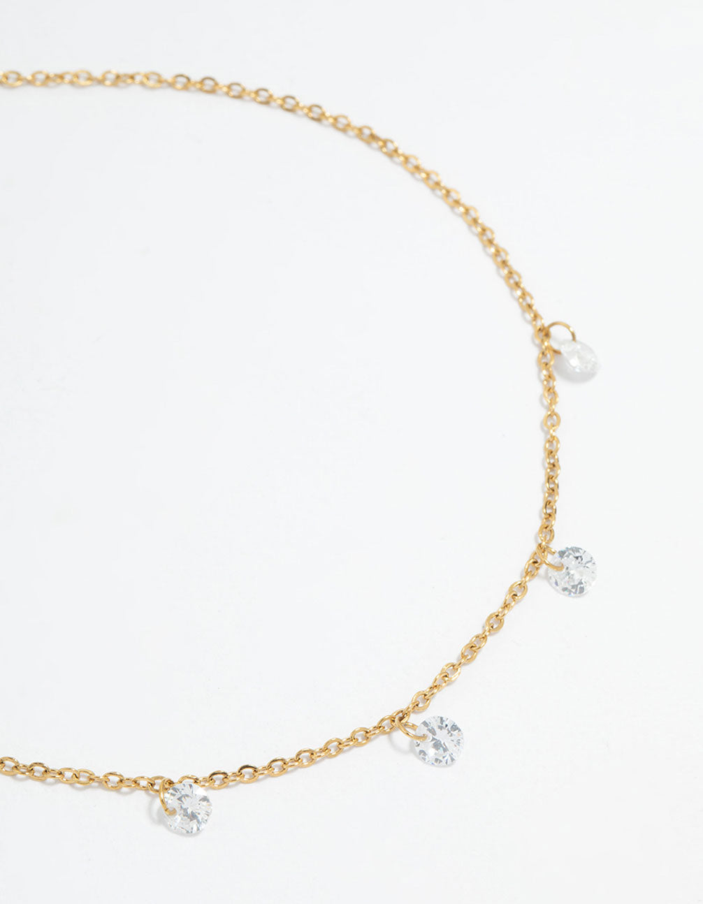 Featuring a waterproof gold plated stainless steel anklet with charm cubic zirconia droplet detail view