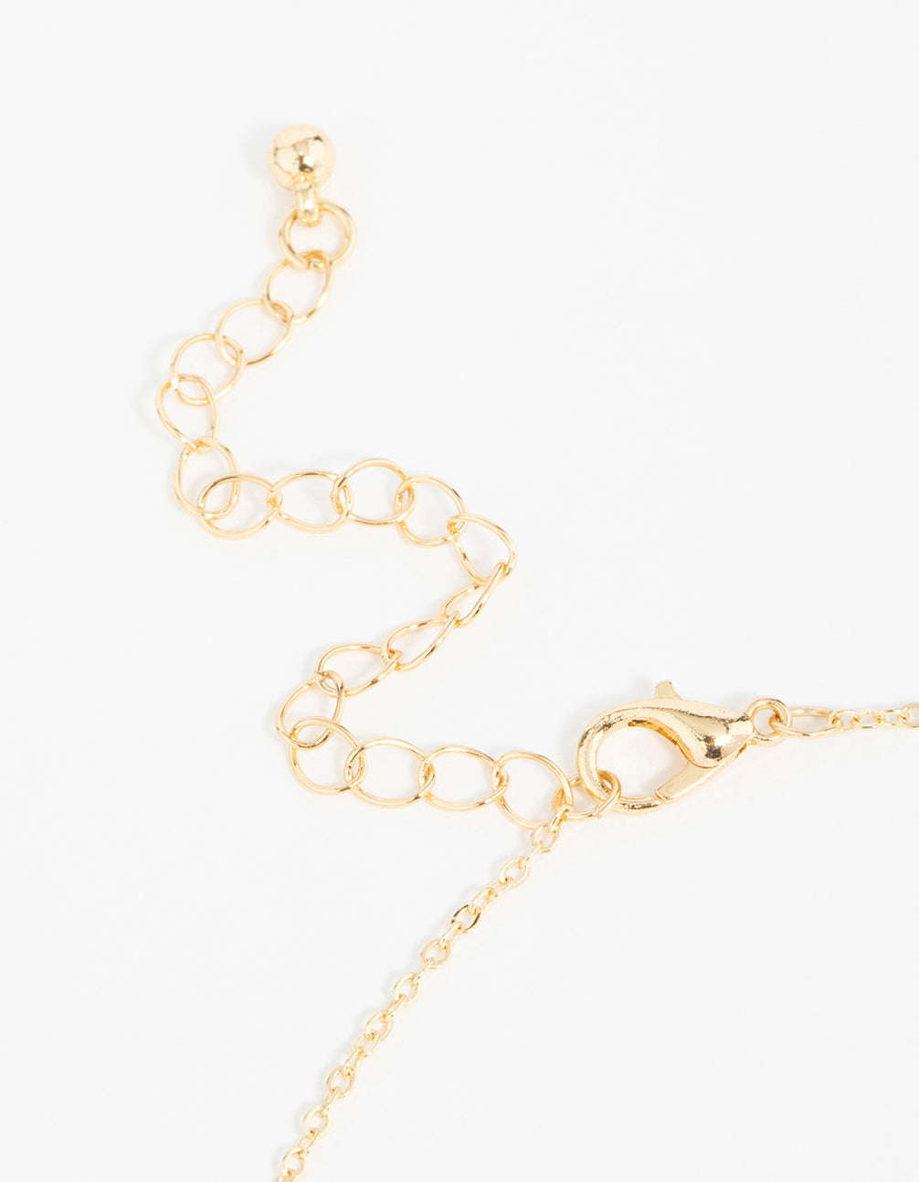 Highlighting gold plated cubic zirconia black flower pendant necklace with floral and crystal accents clasp detail view