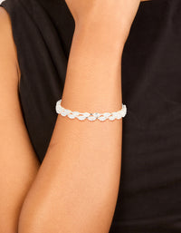 Explore this cubic zirconia navette tennis bracelet crafted from silver with statement styling on wrist view - link has visual effect only