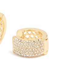 Detailed view of gold plated medium huggie earrings with cubic zirconia stones and closure mechanism post detail view - link has visual effect only