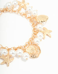 Gold Pearl Mixed Ocean Charm Bracelet - link has visual effect only