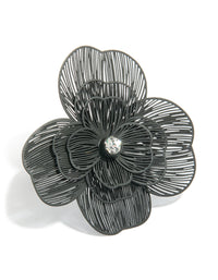Featuring a black flower statement ring with silver finish front view - link has visual effect only