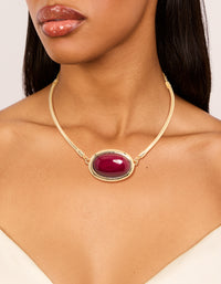 Featuring a gold red large stone and tube necklace in crimson on neck view - link has visual effect only