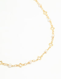 Gold Plated Pearl Flower Outline Necklace - link has visual effect only