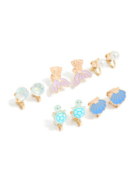 Featuring kids turtle and mermaid clip on earrings in a 5-pack with ocean pearl and shell feature in gold lavender light blue mint cream front view - link has visual effect only
