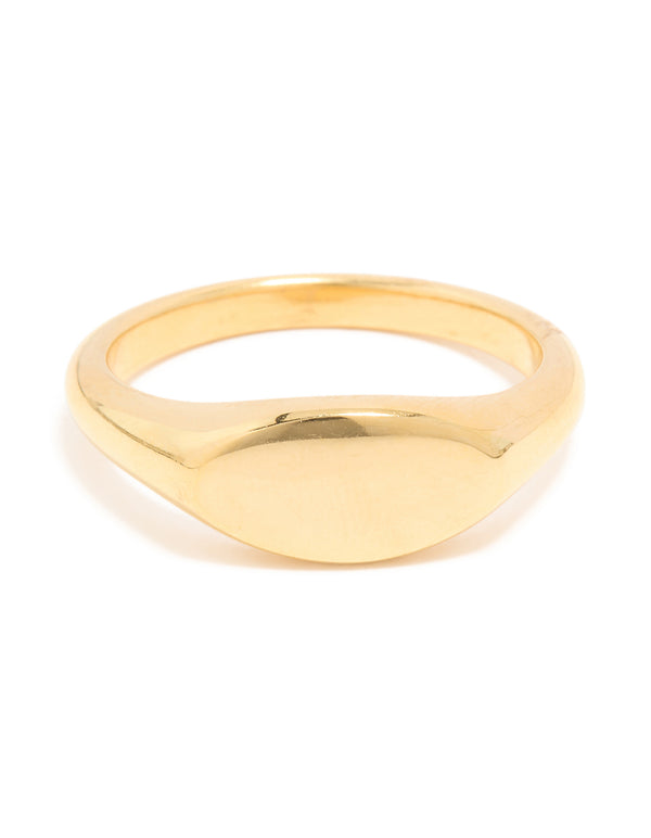 Featuring a waterproof gold plated stainless steel oval signet ring close up view