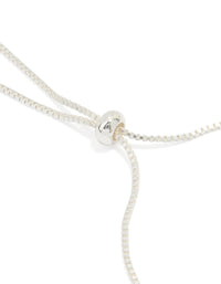 Silver Plated Cubic Zirconia Bow Outline Toggle Bracelet - link has visual effect only
