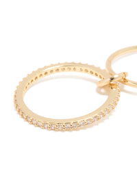 Crafted from gold plated material, this ring features cubic zirconia stones and simple loop design close up view - link has visual effect only