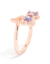 This elegant bow ring in rose gold with cubic zirconia highlights the band thickness and prong setting side detail view - link has visual effect only