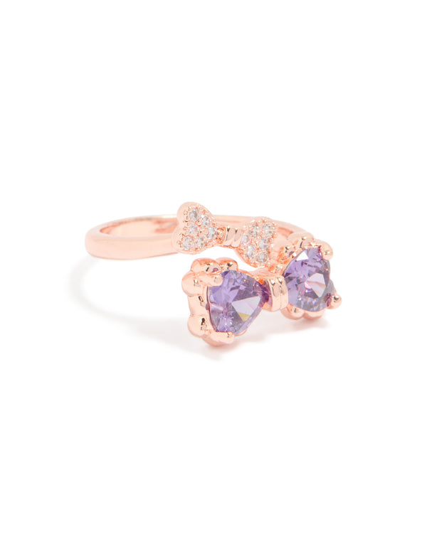 Showcasing a dainty bow ring crafted from rose gold featuring cubic zirconia stones in violet accents front view