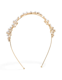 Showcasing a cubic zirconia vine and pearl headband in gold front view - link has visual effect only