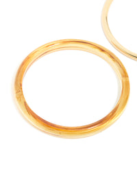 Showcasing gold plated acrylic bangles in a 2-pack front view - link has visual effect only