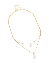 Featuring a gold plated cubic zirconia pearl layered necklace front view - link has visual effect only