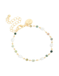 Displaying a gold plated bracelet featuring green beads and pearls front view - link has visual effect only