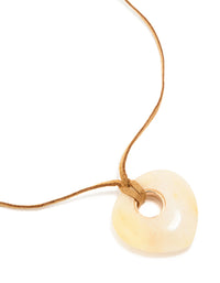 Cream Stone Pendant Brown Cord Necklace - link has visual effect only