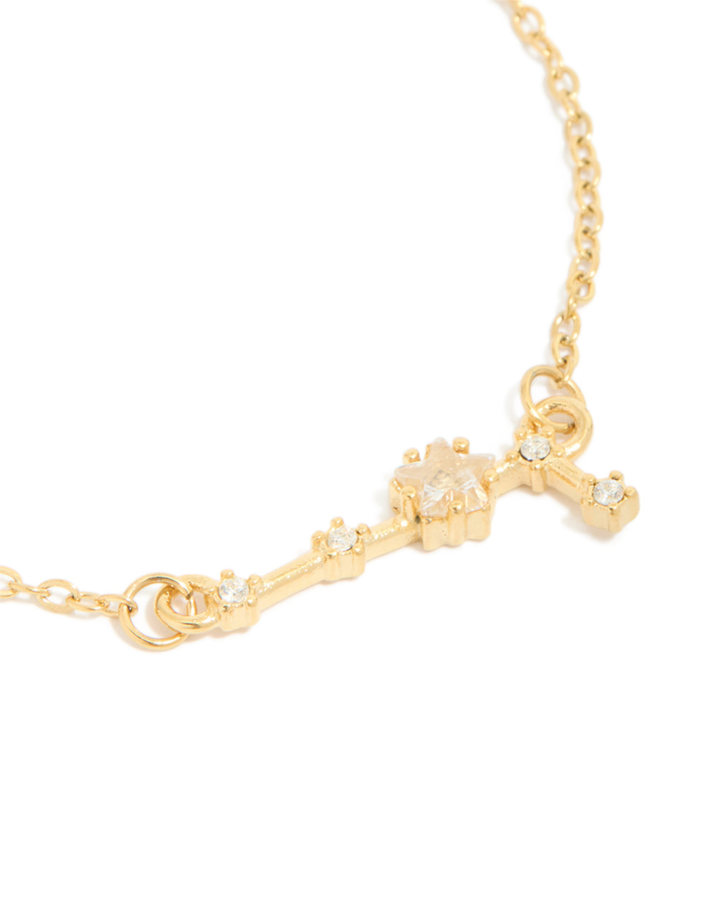 Displaying a waterproof celestial bracelet with gold plated stainless steel and cubic zirconia star sign close up view