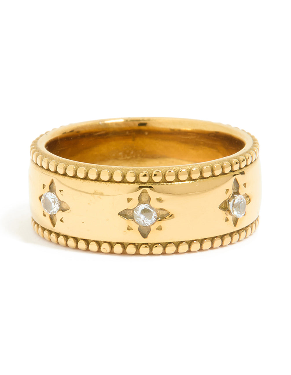 A waterproof gold plated stainless steel cubic zirconia star thick band ring in celestial design close up view