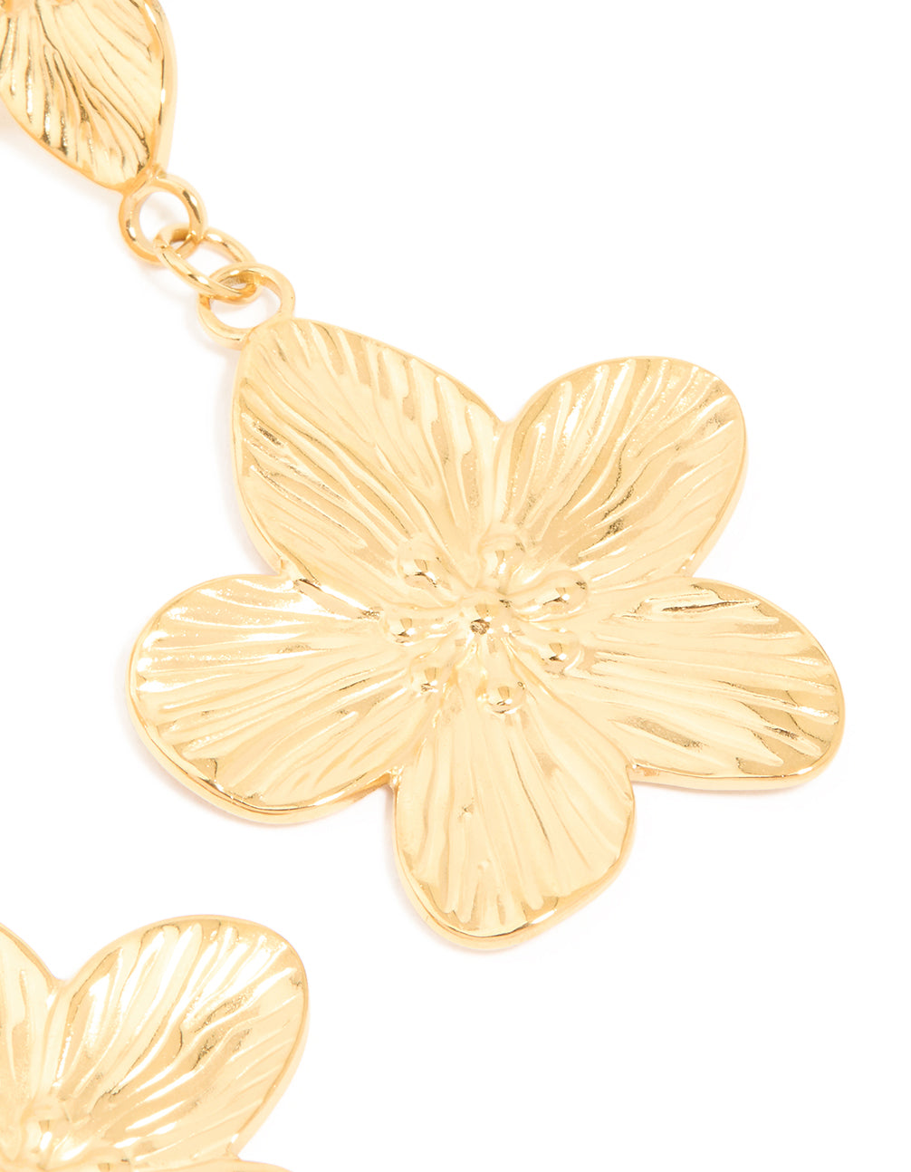Detailed view of waterproof gold plated stainless steel flower drop earrings and textured petals close up view
