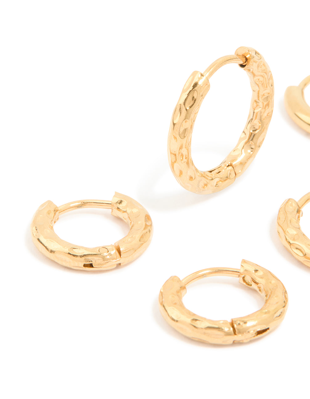 Showcasing waterproof gold plated stainless steel mixed detail huggie earrings in a 3-pack close up view