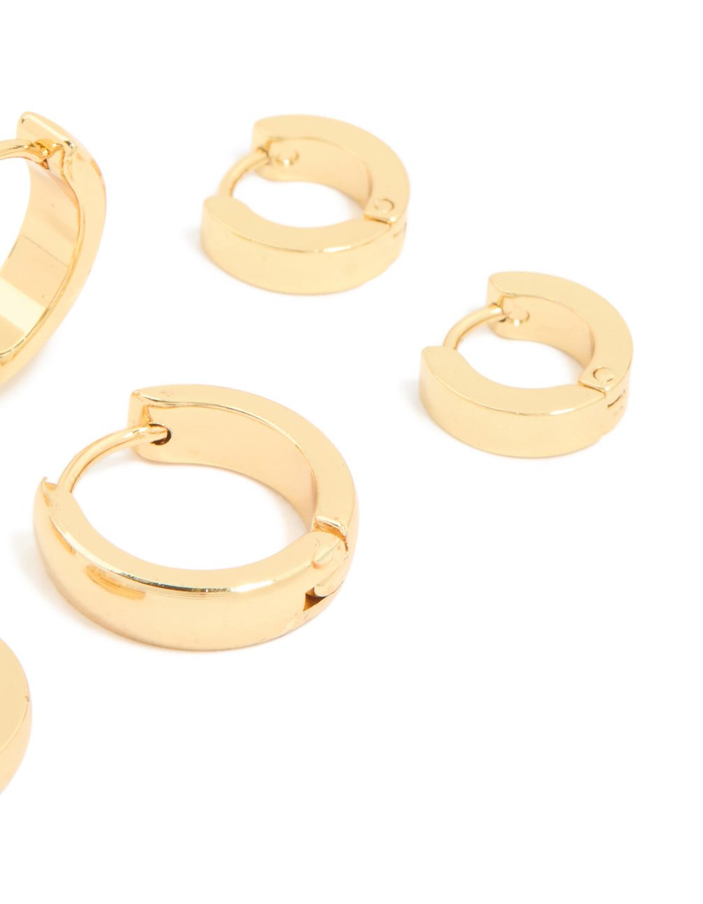 Designed with waterproof gold plated stainless steel mix clicker hoop earrings in a 3-pack post detail view