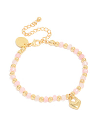Showcasing a waterproof gold plated stainless steel bracelet with pink beads and heart charm in light pink front view - link has visual effect only