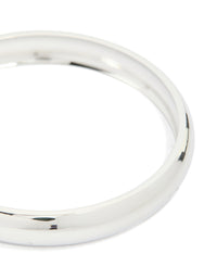 Featuring a waterproof stainless steel round smooth bangle in silver close up view - link has visual effect only