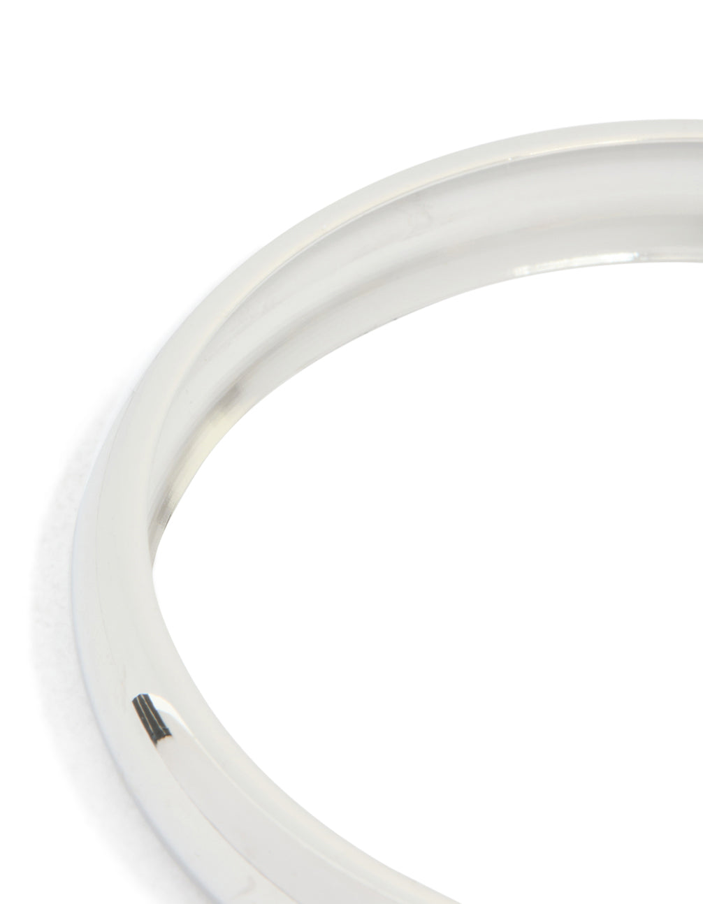 Featuring a waterproof stainless steel round smooth bangle in silver close up view