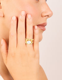 Showcasing a waterproof gold plated stainless steel fancy cubic zirconia split band ring on finger view - link has visual effect only