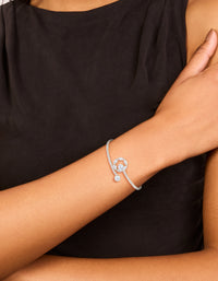 Featuring a silver cubic zirconia open circle wrist cuff bracelet on wrist view - link has visual effect only