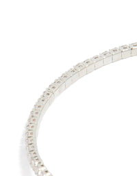 Highlighting a silver cubic zirconia open circle wrist cuff bracelet close up view - link has visual effect only