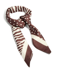 Showcasing a half spot and zebra fabric scarf in saddle brown and ivory side view - link has visual effect only