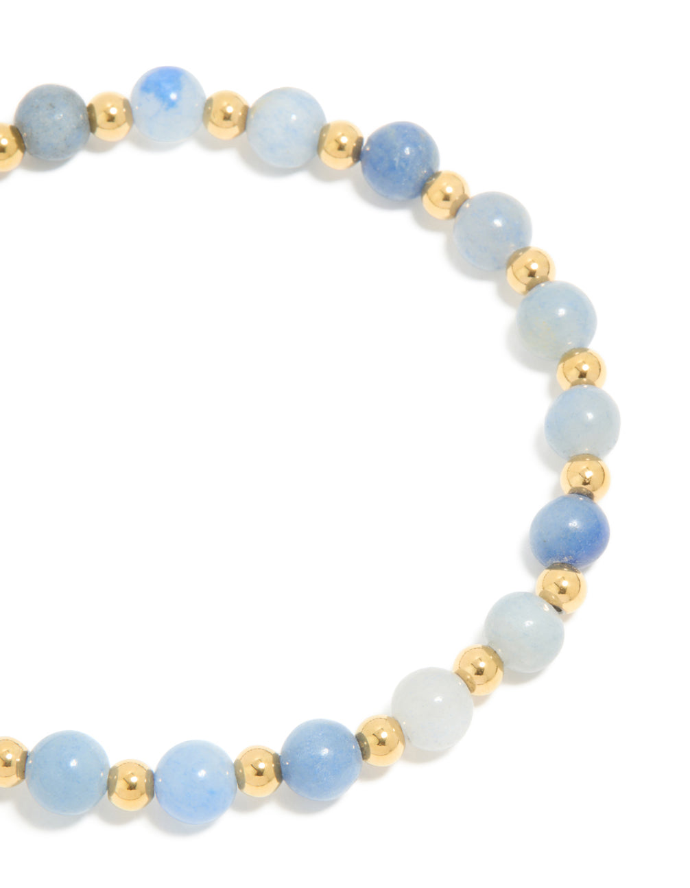 Showcasing a waterproof gold plated stainless steel blue beaded stretch bracelet with light and powder tones in a dainty style close up view