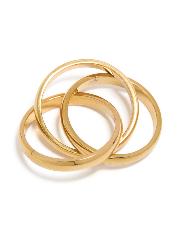 This waterproof gold plated stainless steel triple layered twist moving ring showcases dainty design close up view