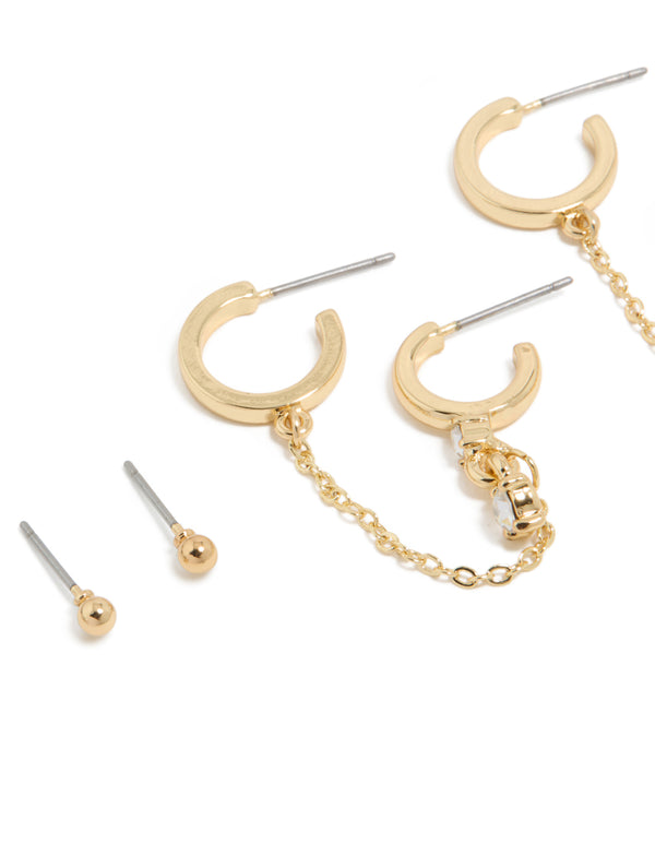 Elegant gold plated cubic zirconia huggie and chain earrings in a 5-pack featuring crystal embellishments and mixed hoop and stud closures close up view