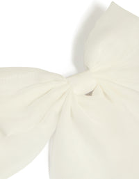 Showcasing a white fabric large bow clip in ivory with solid print detail view - link has visual effect only