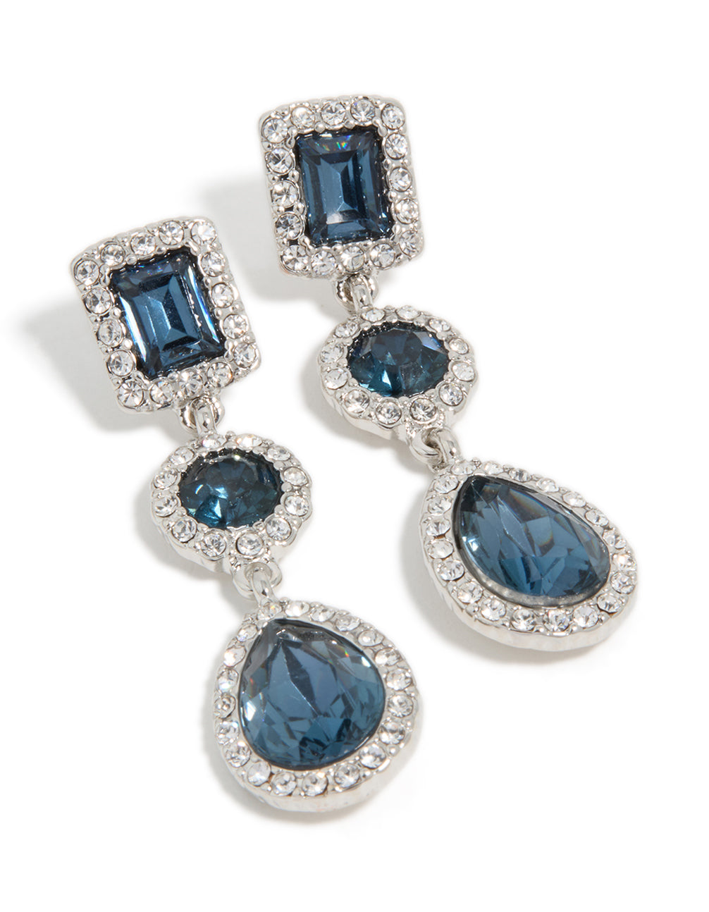 Elegant multi shape drop earrings with teal gemstones surrounded by diamante halos in silver front view