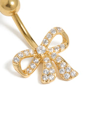 Belly bar designed with a bow in gold-plated surgical steel, featuring cubic zirconia close up view - link has visual effect only