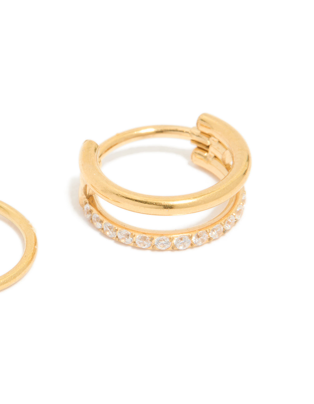 Close-up view of gold plated surgical steel nose rings with cubic zirconia in a 2-pack close up view