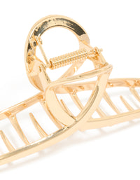 Showcasing solid gold twisted loop claw clip detail view - link has visual effect only