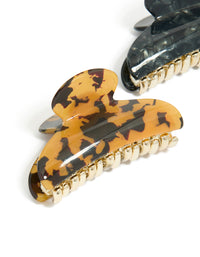 Featuring tortoiseshell and black acrylic curved claw clips in a 2-pack with gold detail view - link has visual effect only