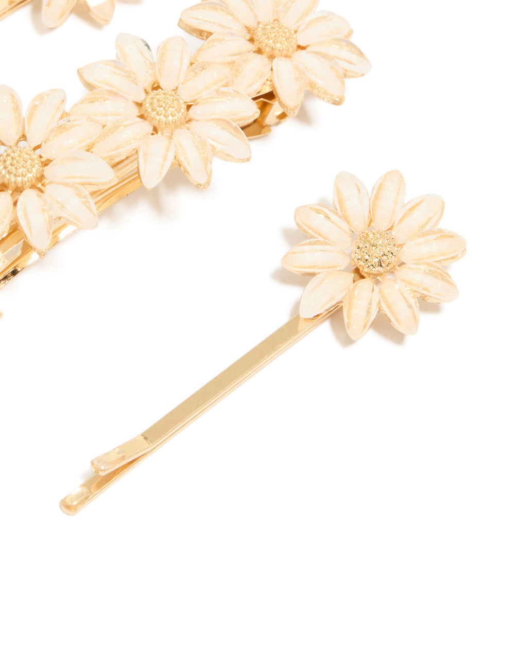 Discover gold detailed flowers hair clips in a 3-pack detail view