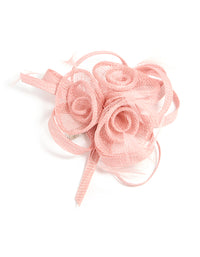 Showcasing a sinamay fabric swirl with feathers and floral design in light pink hair clip front view - link has visual effect only
