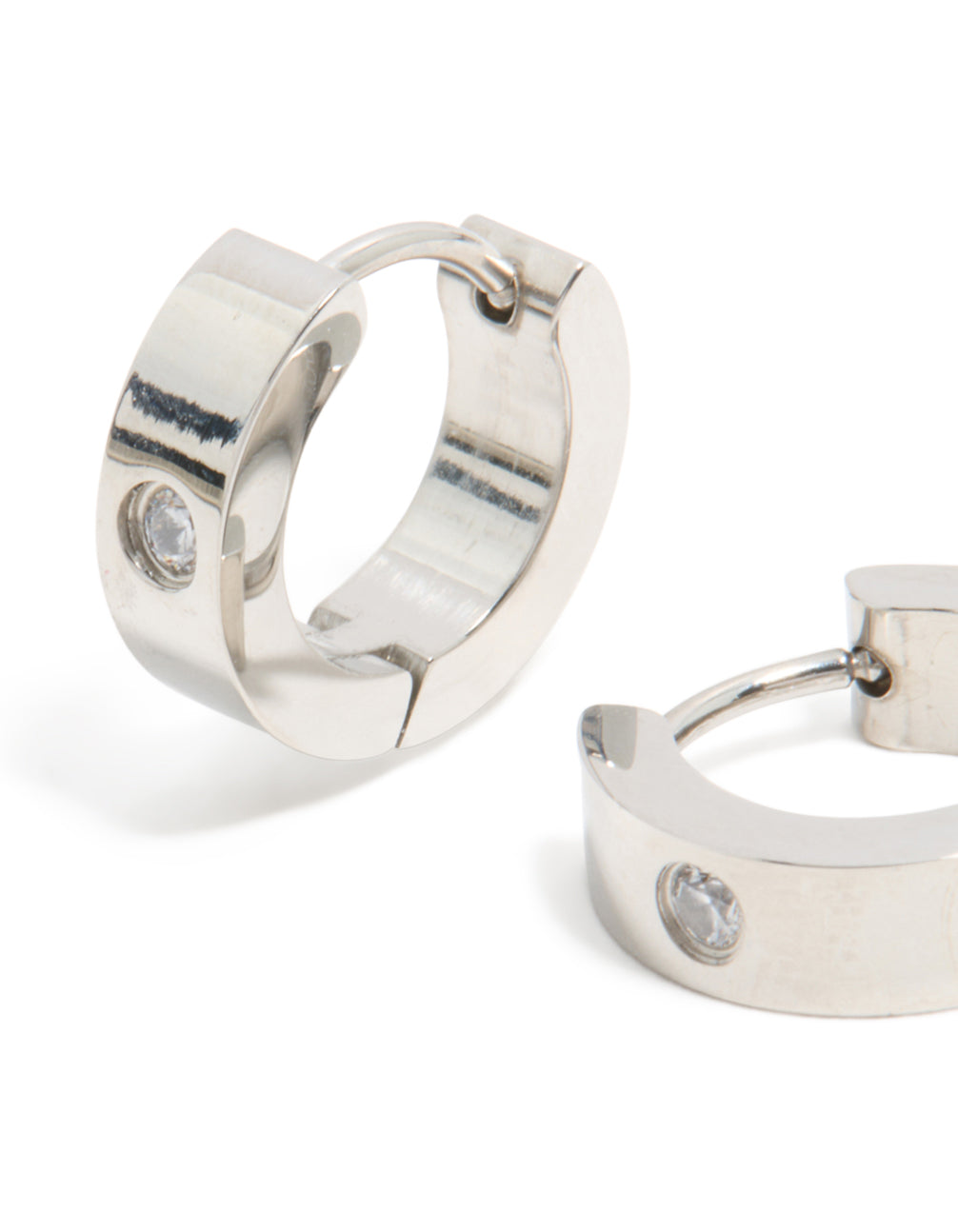 Finely designed are these mens waterproof stainless steel cubic zirconia huggie earrings close up view