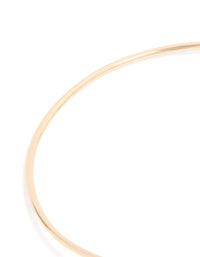 Featuring a gold celestial arm cuff with chain drop detail close up view - link has visual effect only