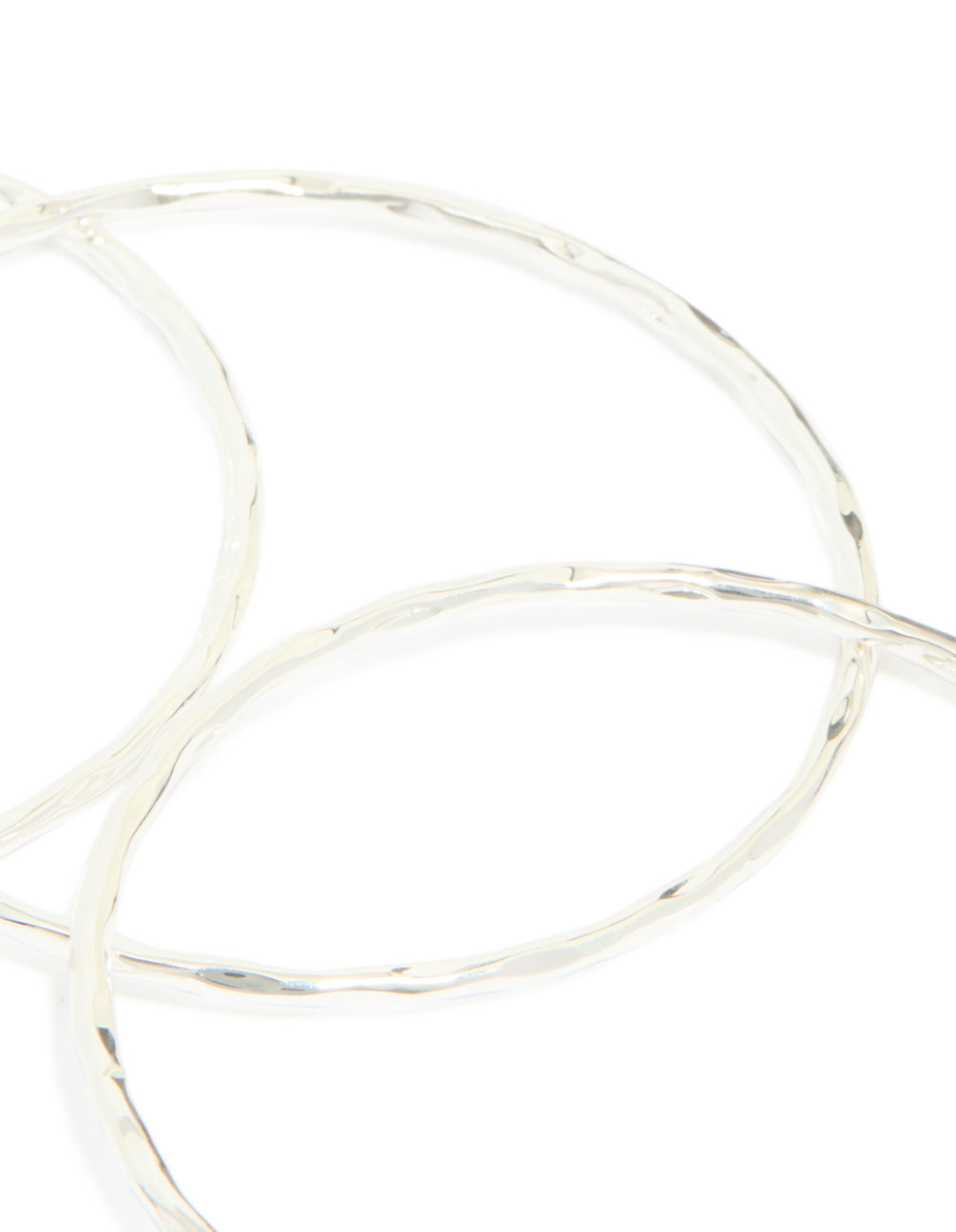 Featuring silver plated textured bangles in a 5-pack set close up view
