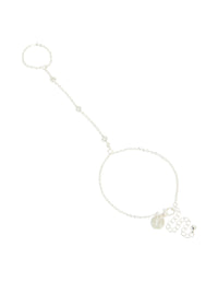 Showcasing a silver plated hand chain bracelet featuring cubic zirconia front view - link has visual effect only