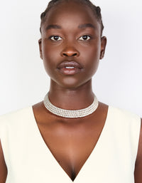Showcasing a statement silver diamante choker necklace in versatile on model view - link has visual effect only