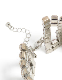 A silver colossal diamantes statement bracelet with adjustable chain closure detail view - link has visual effect only